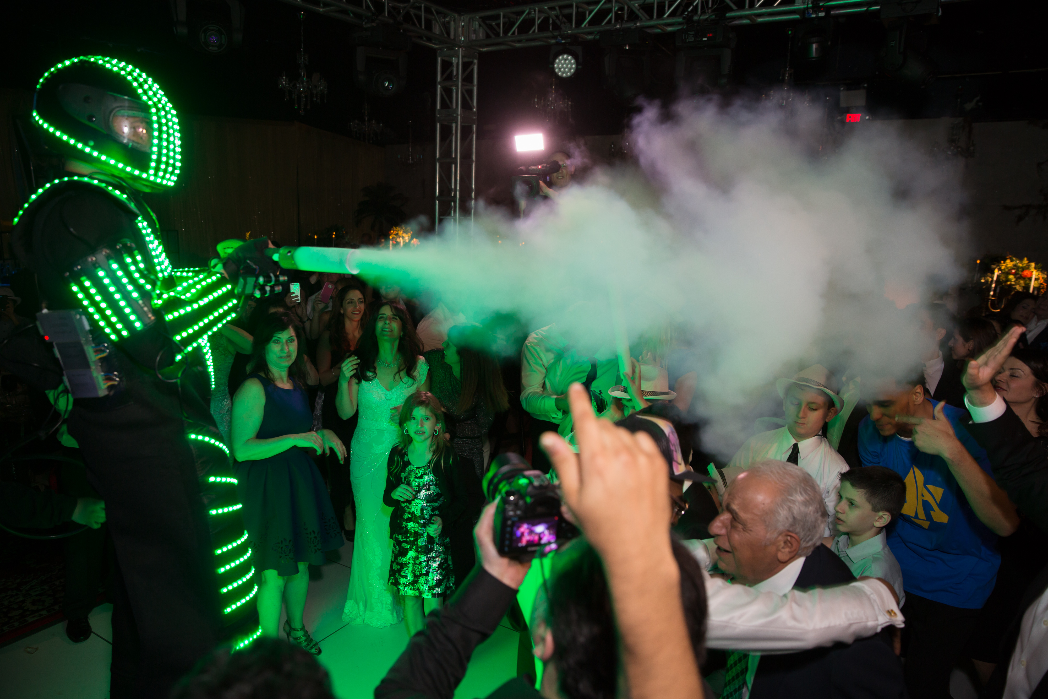 LED robot suit man blasts CO2 bursts over crowd
