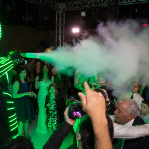 LED robot suit man blasts CO2 bursts over crowd